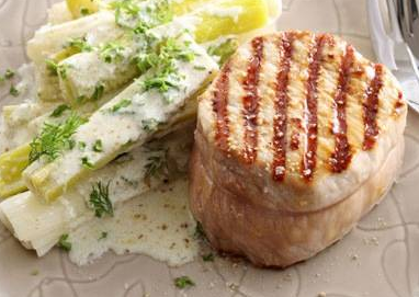 Gegrilde varkensoester met romige prei